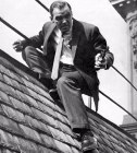 Stanley Baker in the rooftop chase climax scene